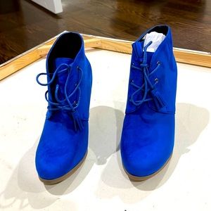 New With Tags Women’s Blue Booties in Size 9.